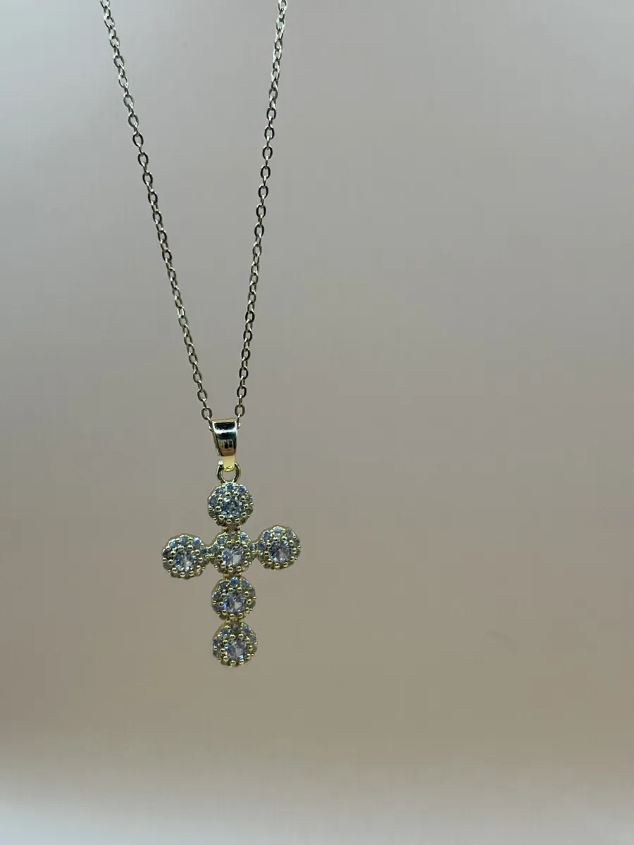 Positions cross (2η) — gold